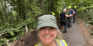 Volunteers and the fire and rescue service clearing rubbish at Kilner Bank, Huddersfield